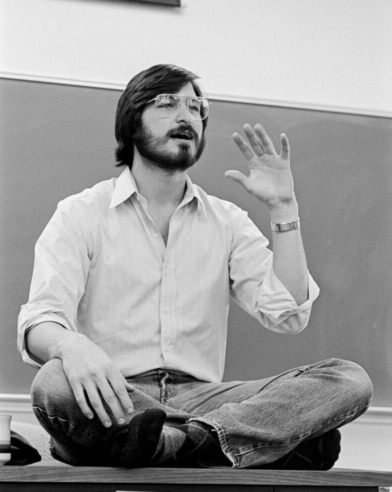 Image may contain Steve Jobs Face Head Person Adult Clothing Jeans Pants Accessories Glasses Footwear and Shoe